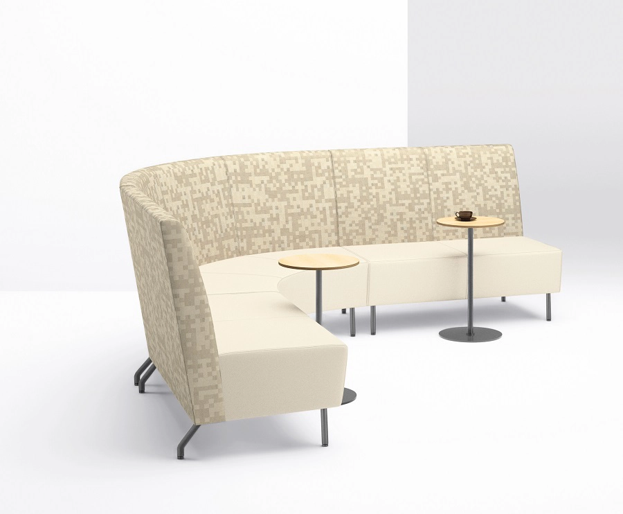 Laptop pull-up tables beside lounge seating