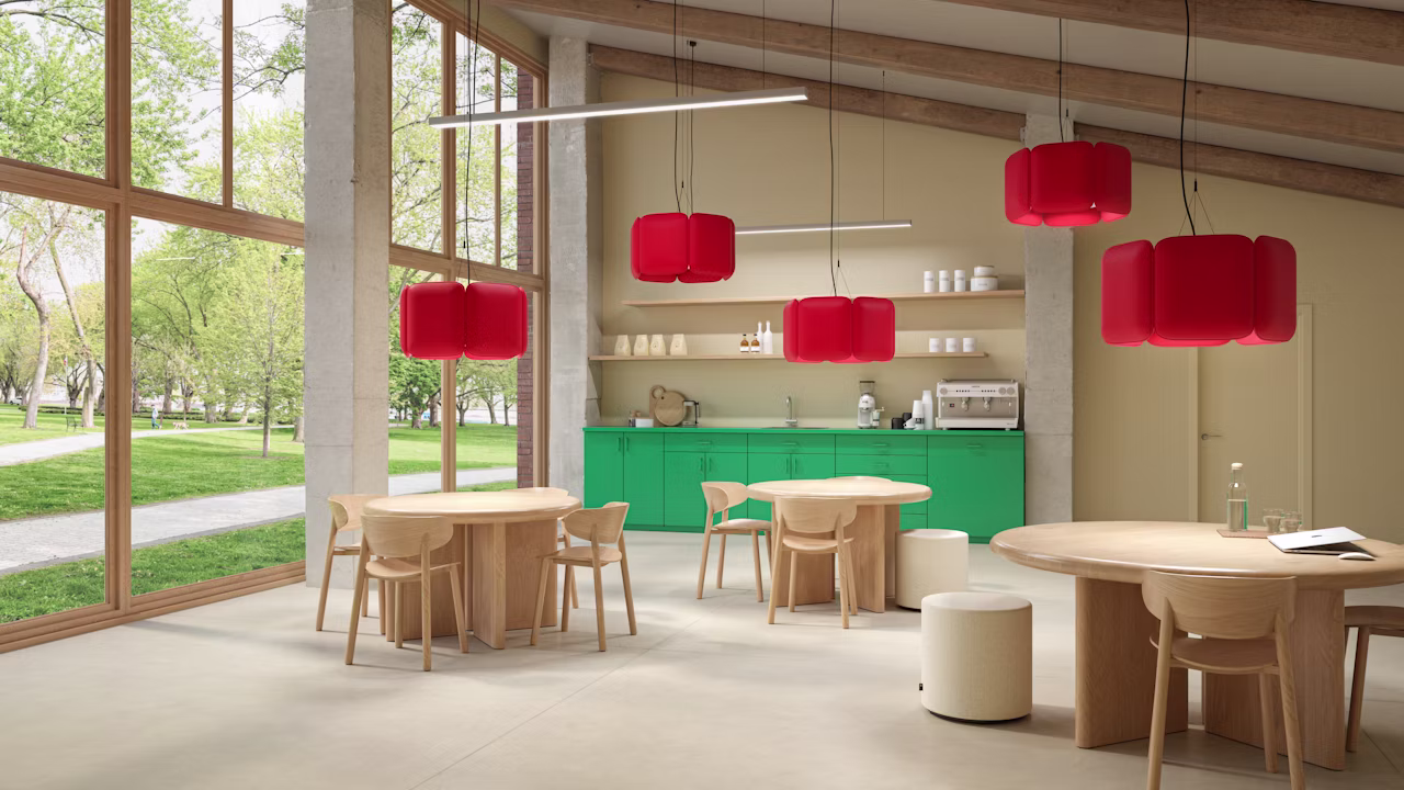 Decorative acoustic lighting suspended over a workspace