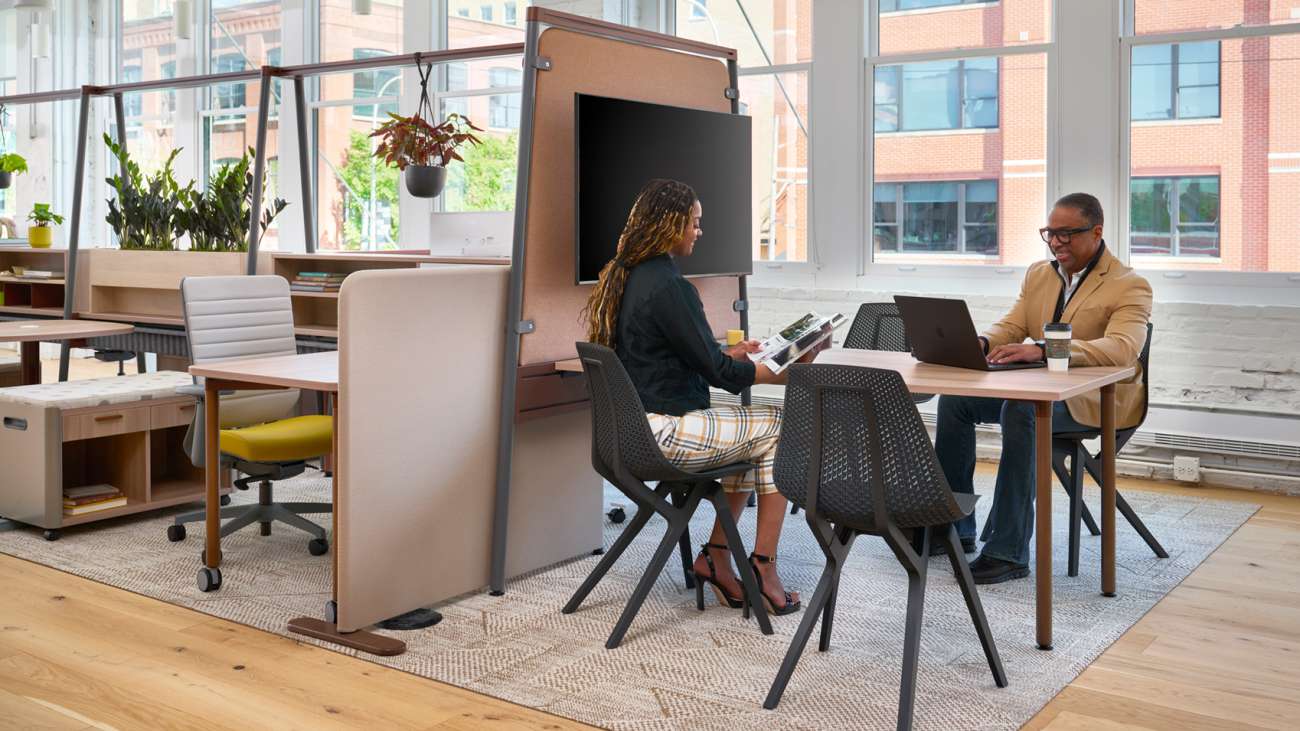 Open corporate workplace with individual workstations