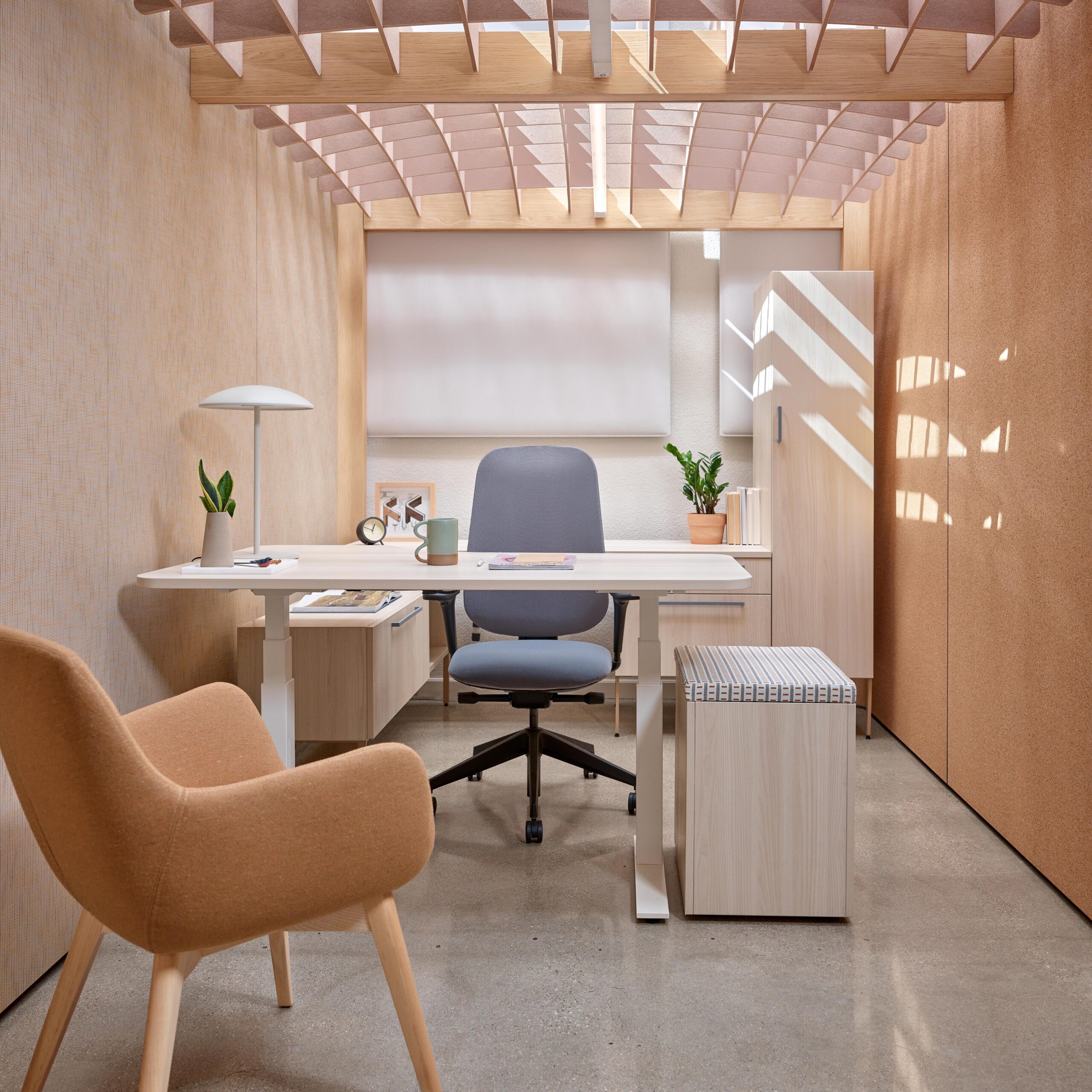 Private office with height-adjustable desk