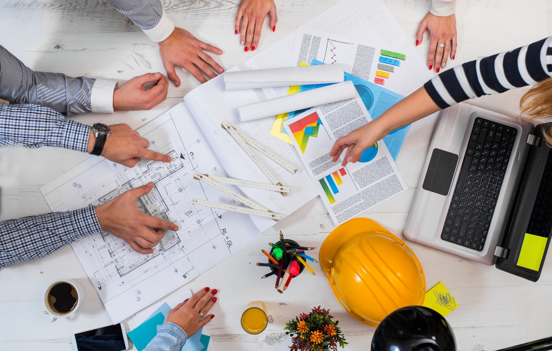 Project team coordinating tasks and schedules