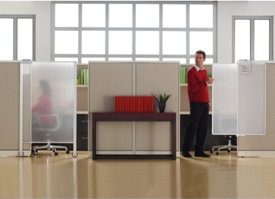 Sliding cubicle door attached to modular office workstation panels
