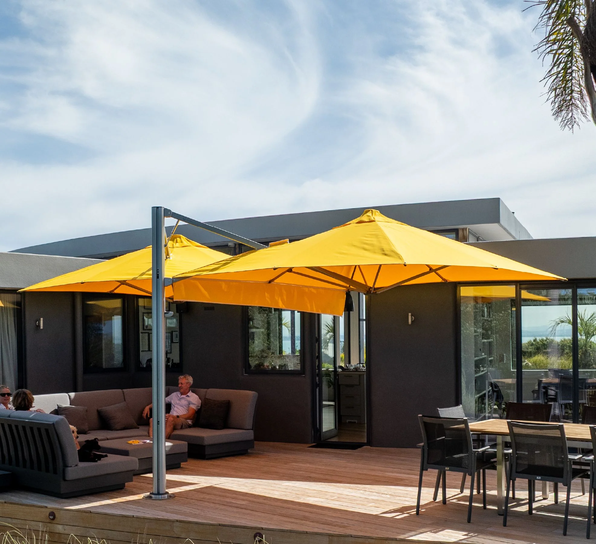 Commercial outdoor seating beneath shade
