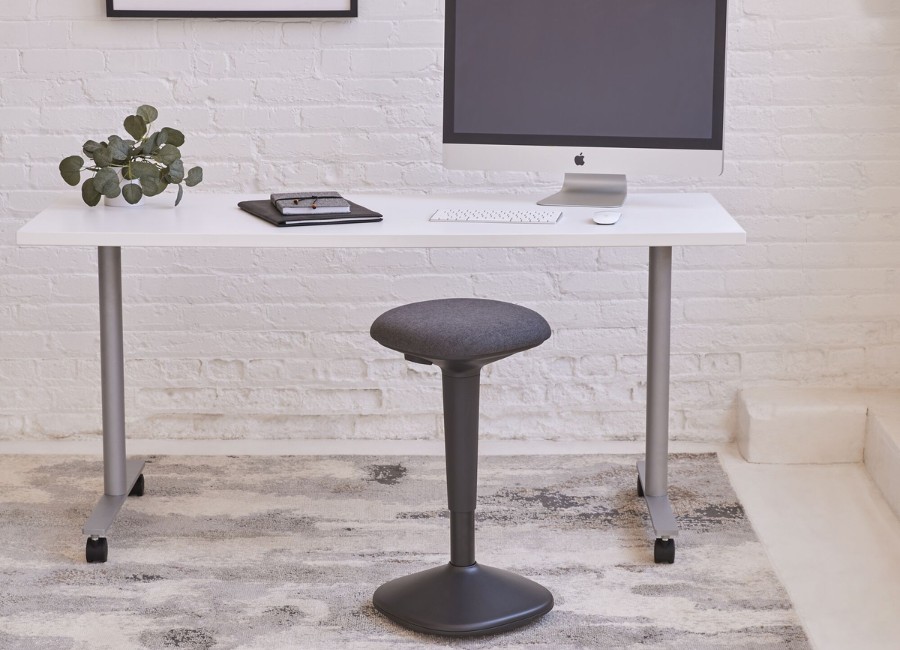 Sit-stand stool for an adjustable-height workstation