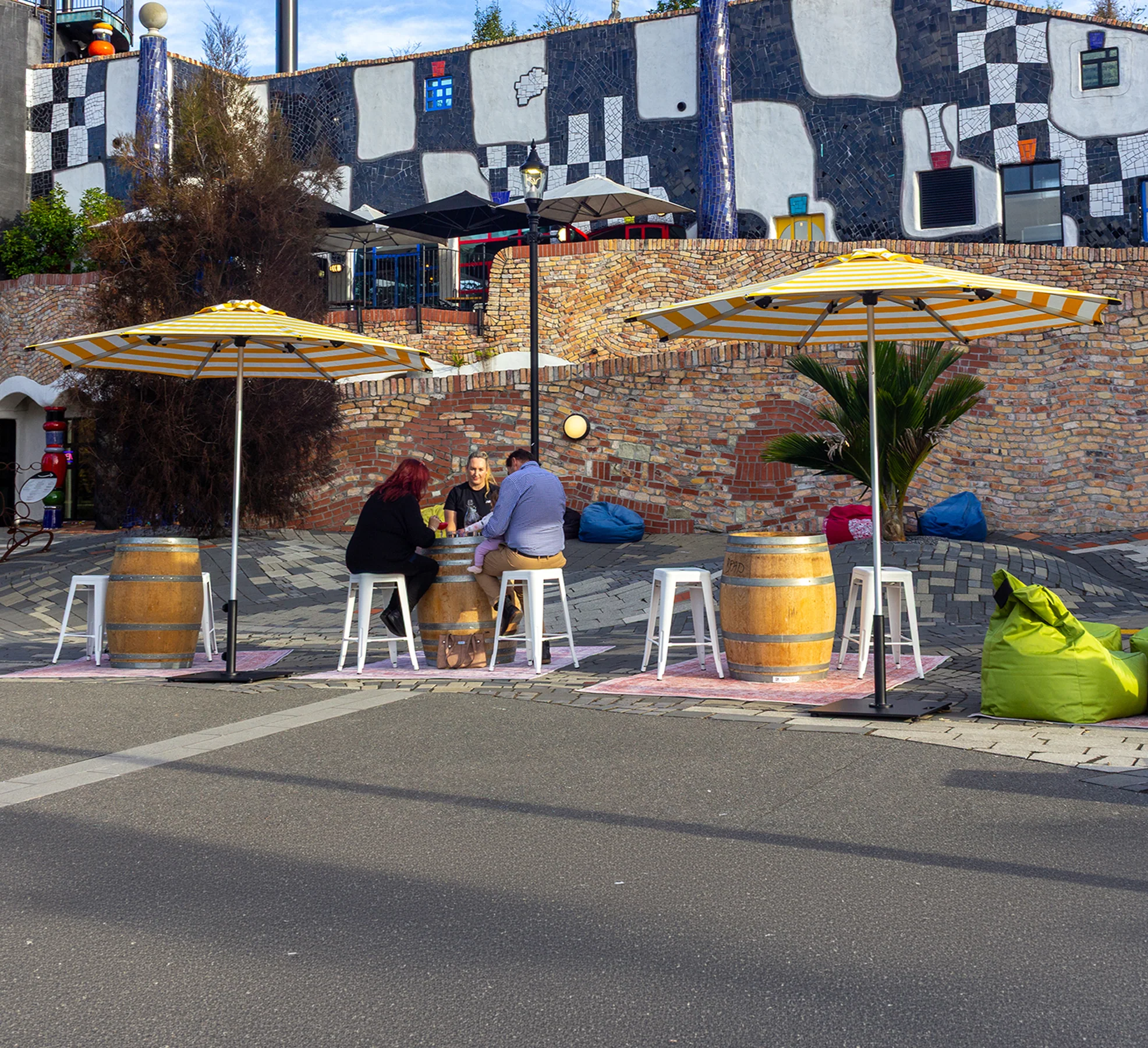 Commercial outdoor seating beneath shade